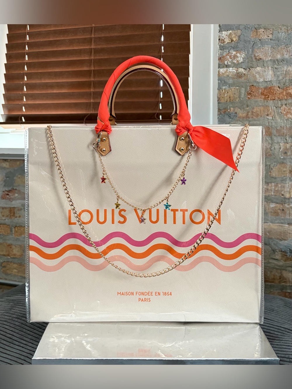 LOUIS VUITTON LIMITED EDITION PAPER SHOPPING BAG IN PVC COVER